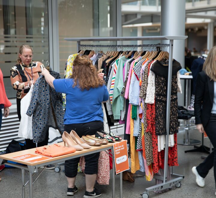 People selling clothes at the second-hand market in Spring 2024