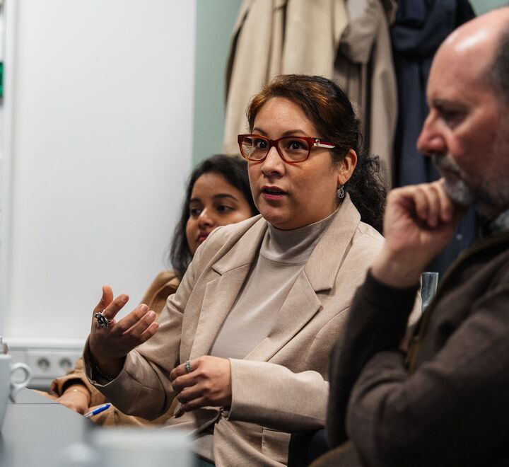 A woman from the audience speaking