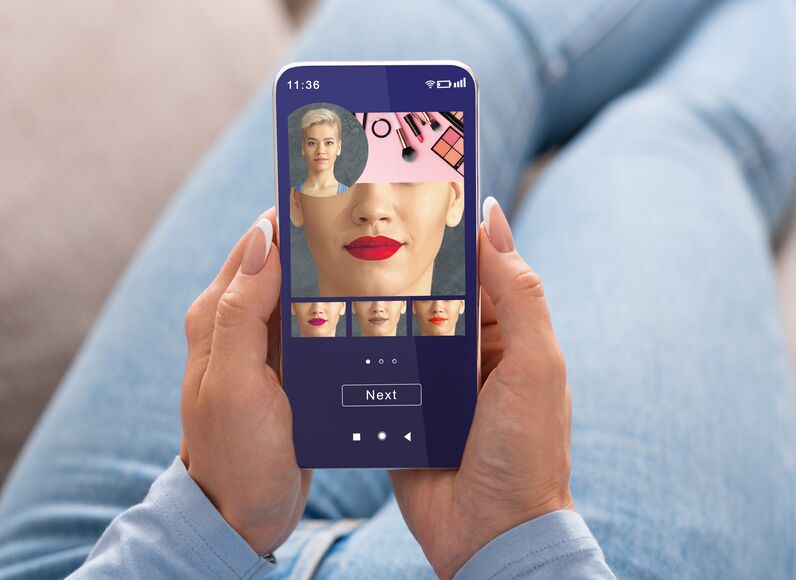 Woman trying different lipsticks with an app
