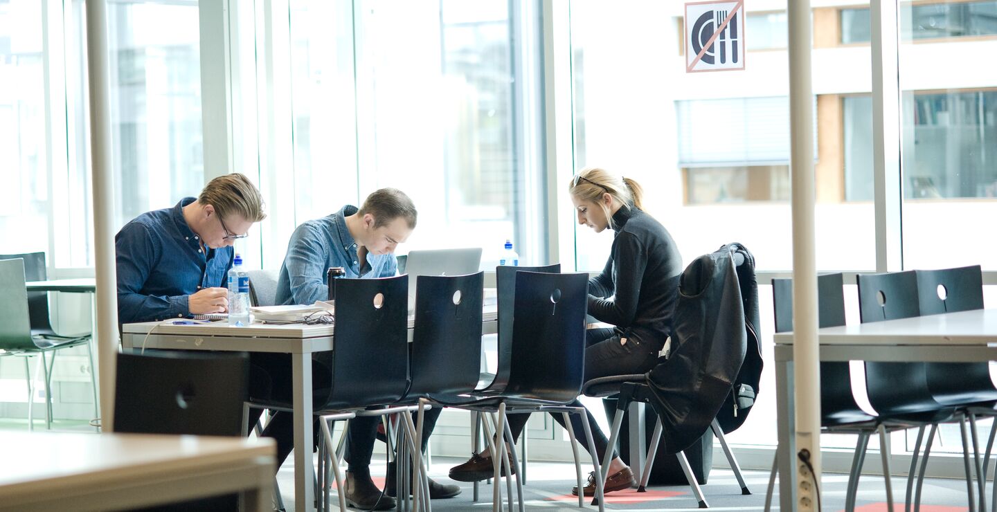 Students reading in library