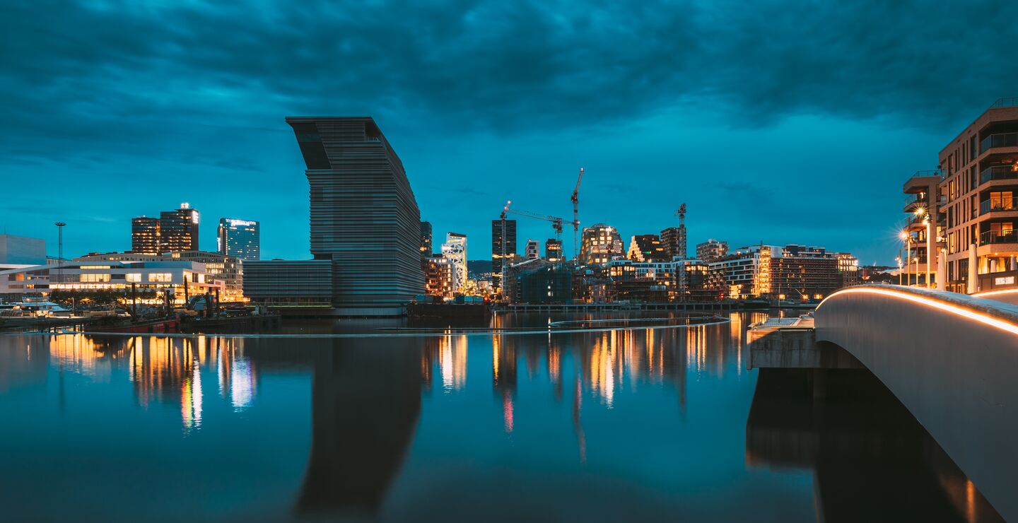 Night view of Oslo Harbor, overlooking the Munch museum and the Barcode district.