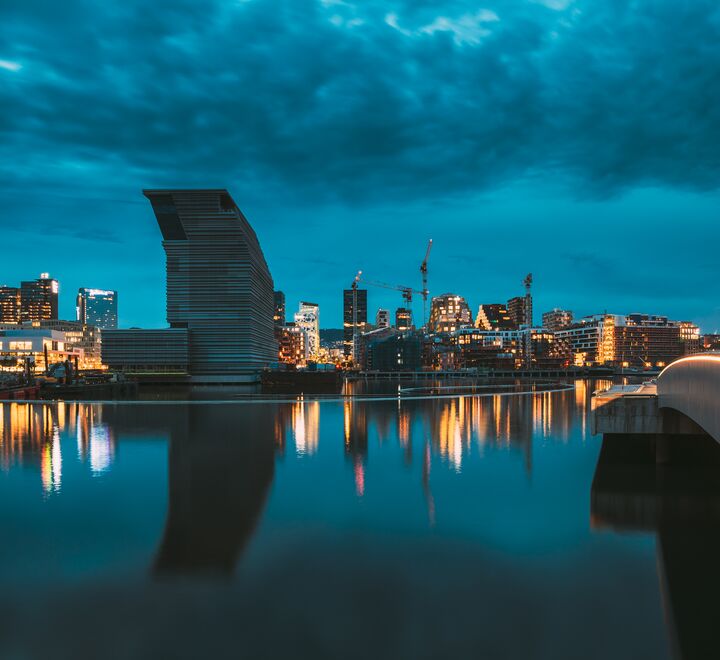 Night view of Oslo Harbor, overlooking the Munch museum and the Barcode district.