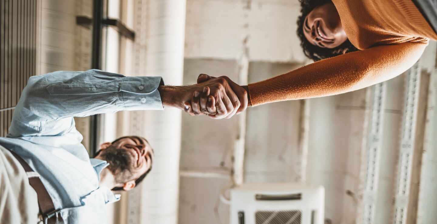Two people shaking hands