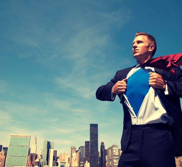 Business leader in super hero pose