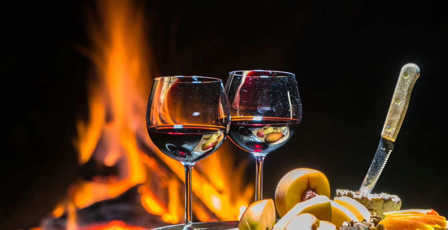 Food and drinks in front of fireplace