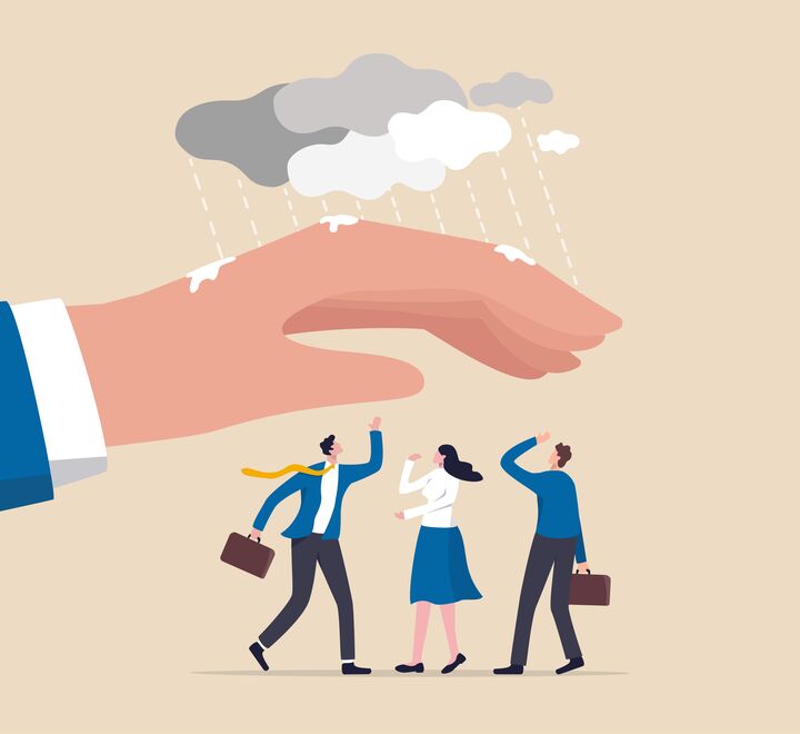 Graphic illustration of leader holding hand over employees to shelter them from rain