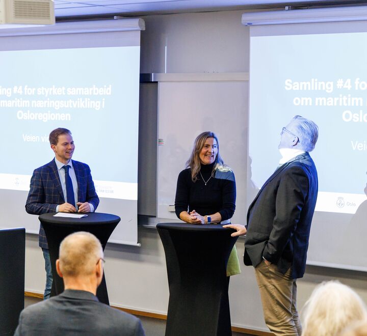 Three of the speakers during the event presenting. Photographed by Adrian Vaagsnes, BI Norwegian Business School.