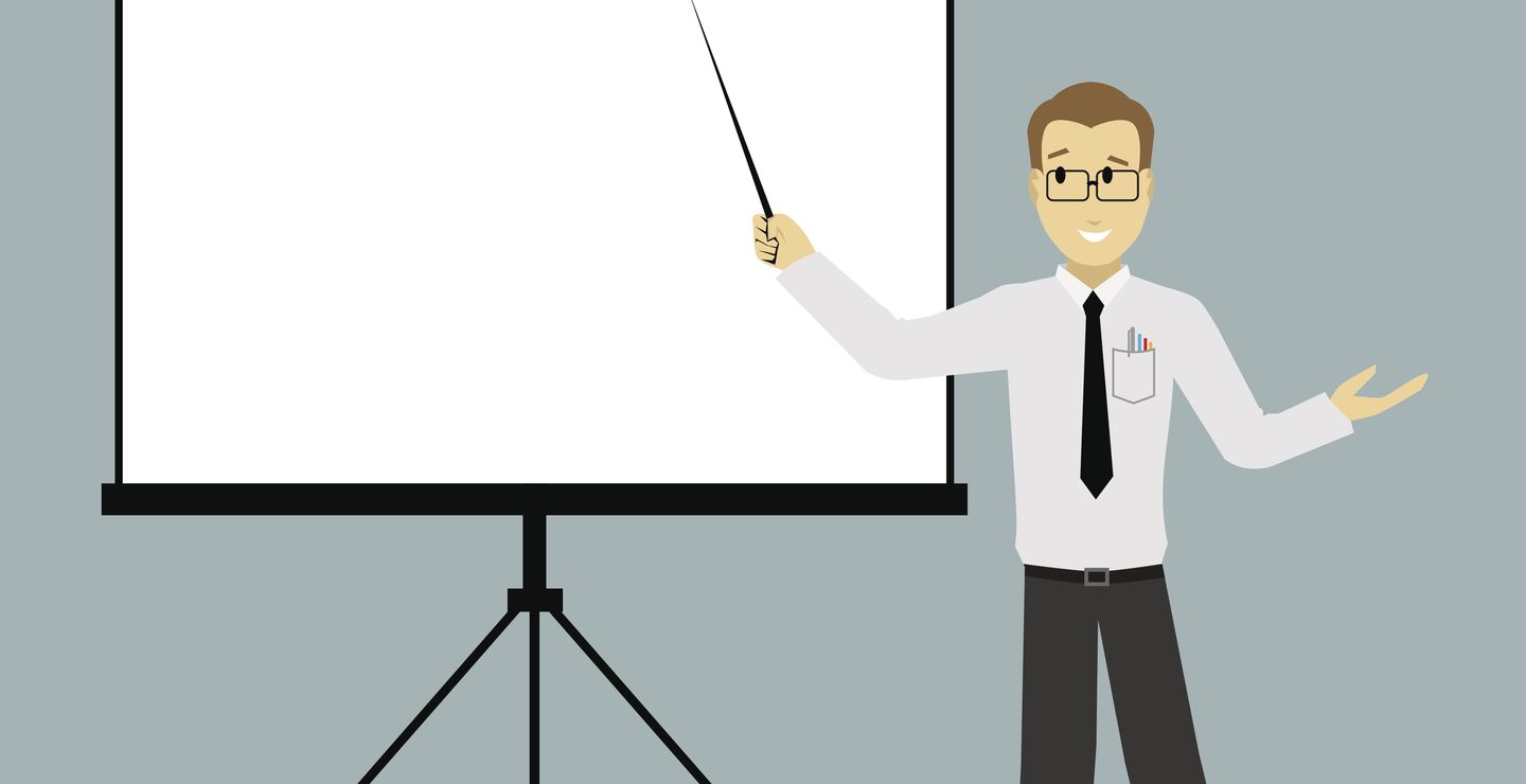 Bilde av businessmann som peker på en tavle