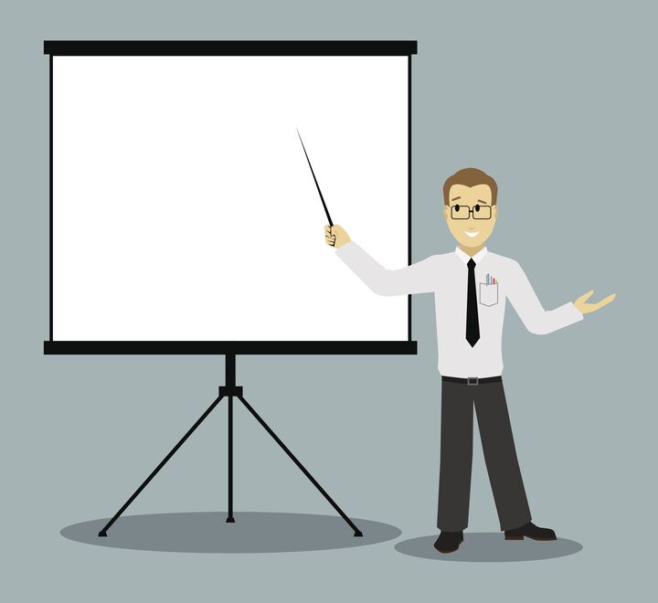 Bilde av businessmann som peker på en tavle