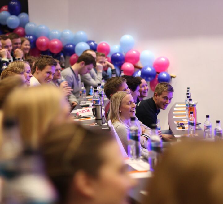 Large group of students in an auditorium