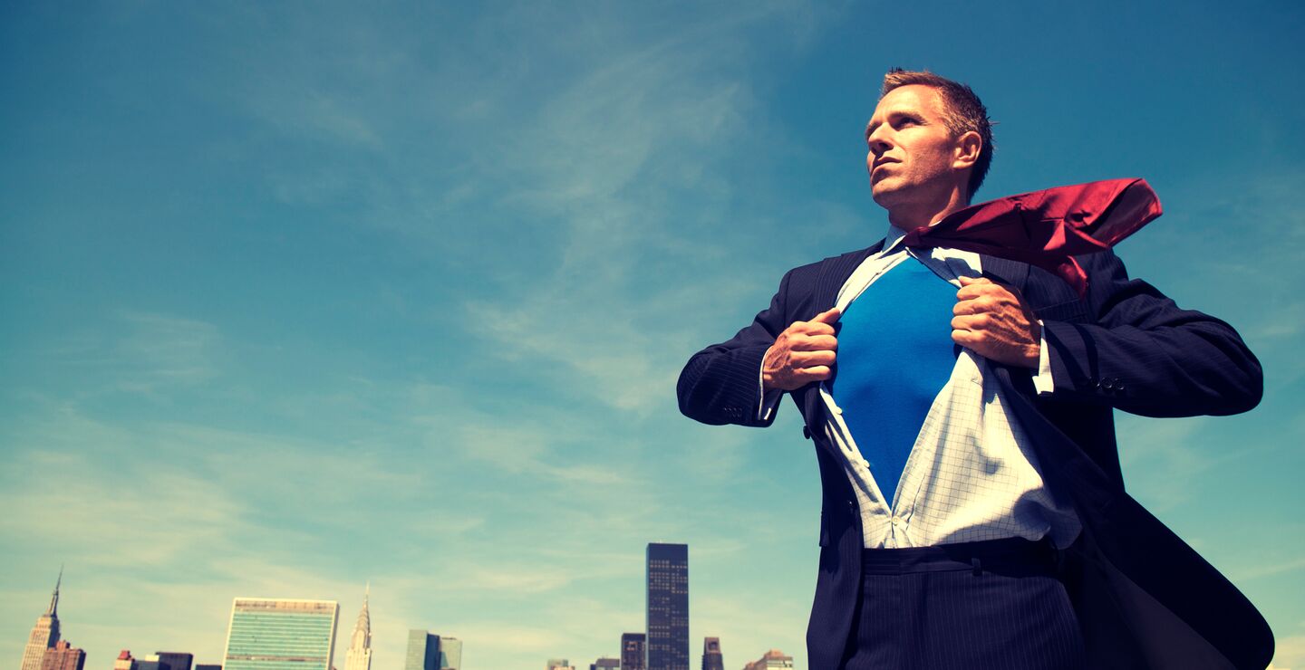 Business leader in super hero pose
