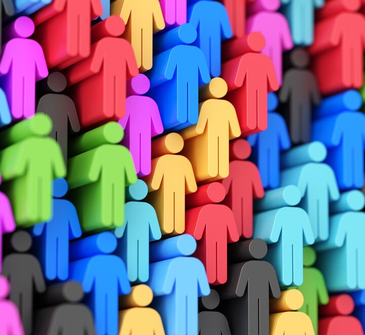 Illustrasjon av en gruppe med fargerike menneske-ikoner.