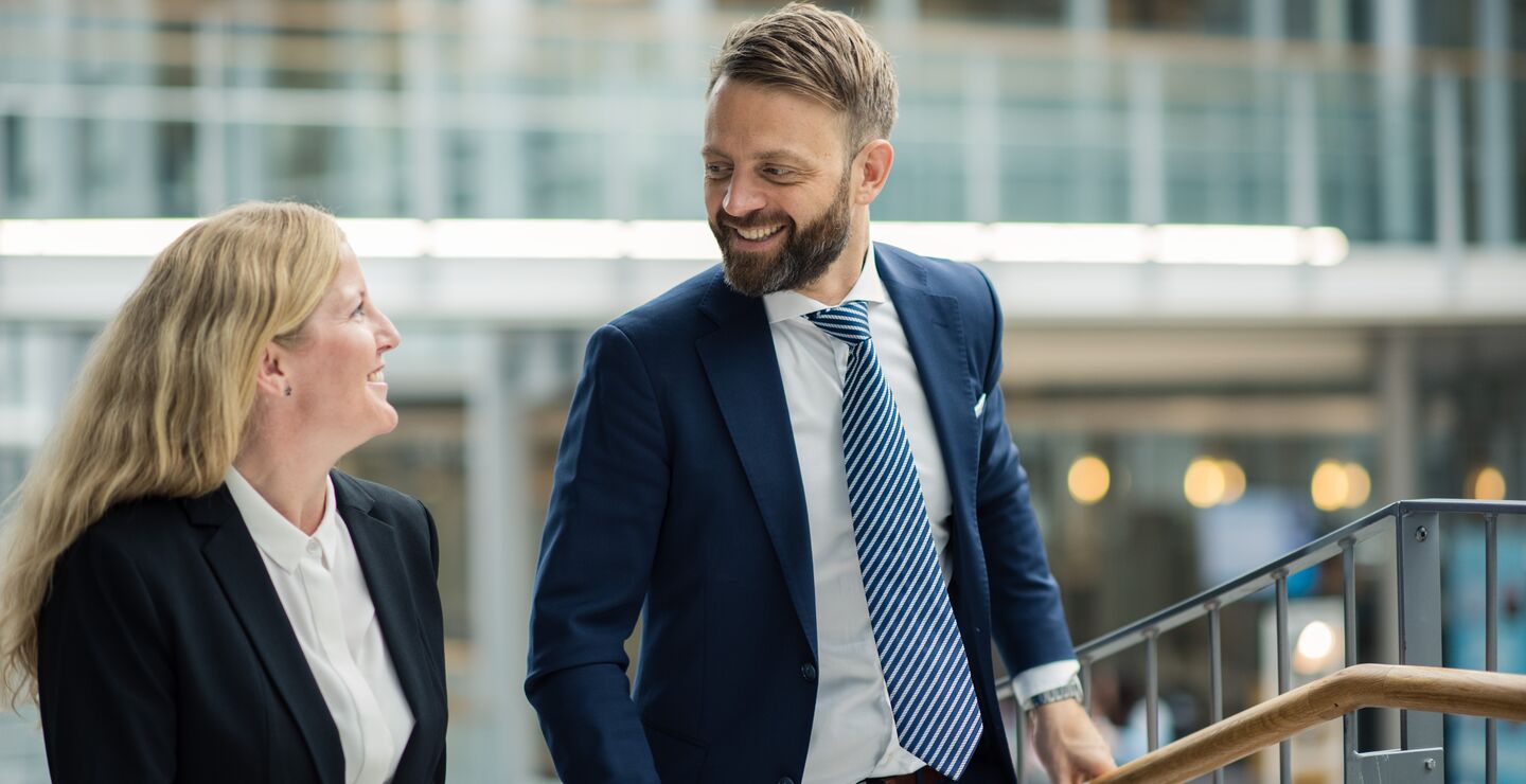 Two colleagues talking