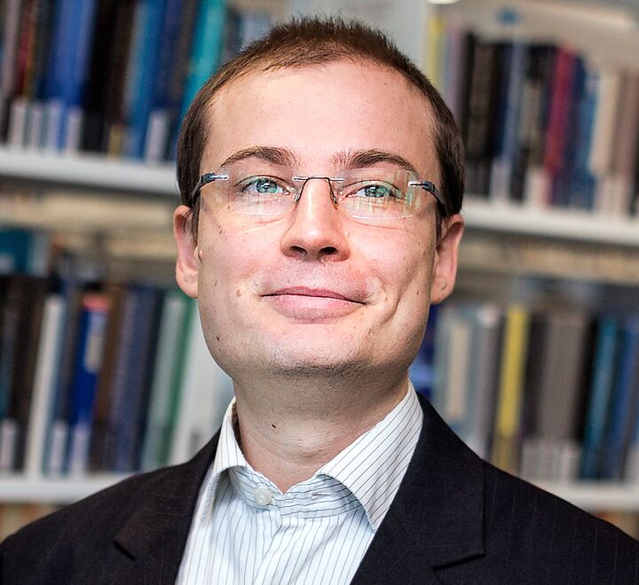 Associate Professor in the Department of Finance, Leon Bogdan Stacescu