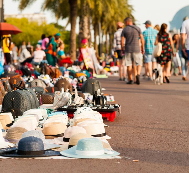Counterfeit goods displayed on sidewalk in Barcelona