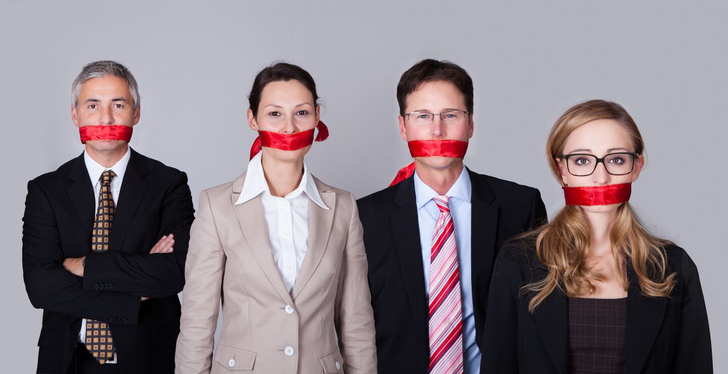 Illustration: employees with red tape covering their mouths