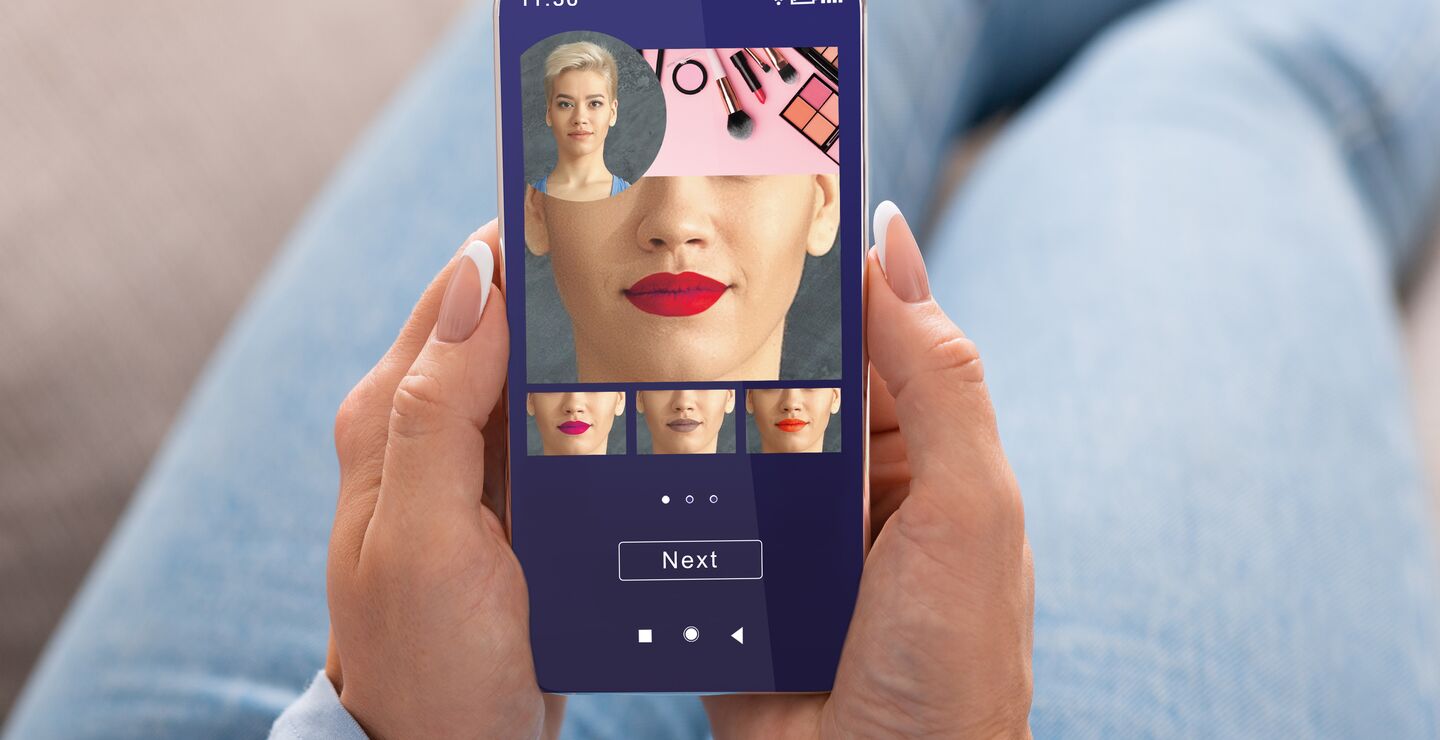 Woman trying different lipsticks with an app