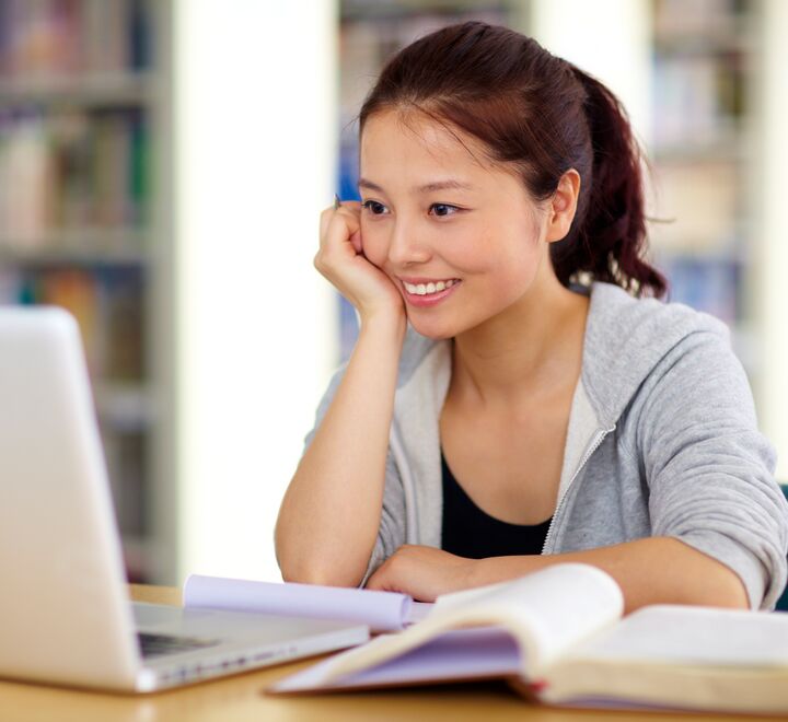 Student looking at a computer