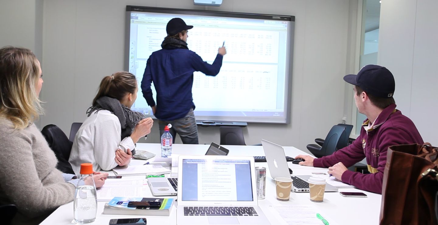 Students working on whiteboard