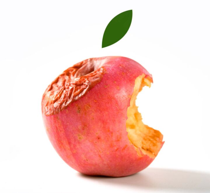 An rotten red apple with a bite