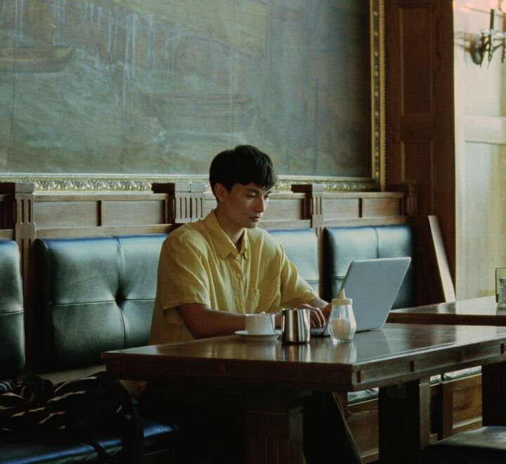 Student with a laptop computer