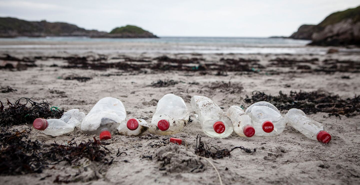 Coca -Cola bottles on the beach