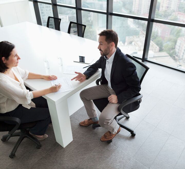 A man and a woman talking
