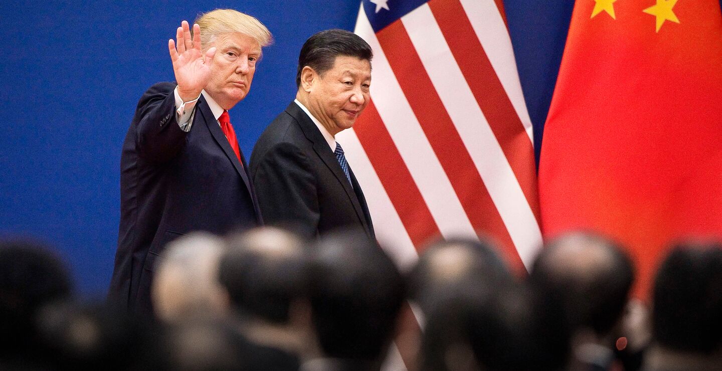 Handelskrigen mellom USA og Kina tilspisser seg. Kan sende konjunkturen ned og skape nye geopolitiske konflikter, skriver Knut Anton Mork. Bildet viser Donald Trump og Kinas president Xi Jinping. Foto: Nicolas Asfouri, Scanpix