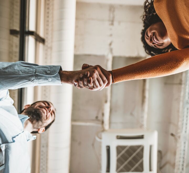 Two people shaking hands