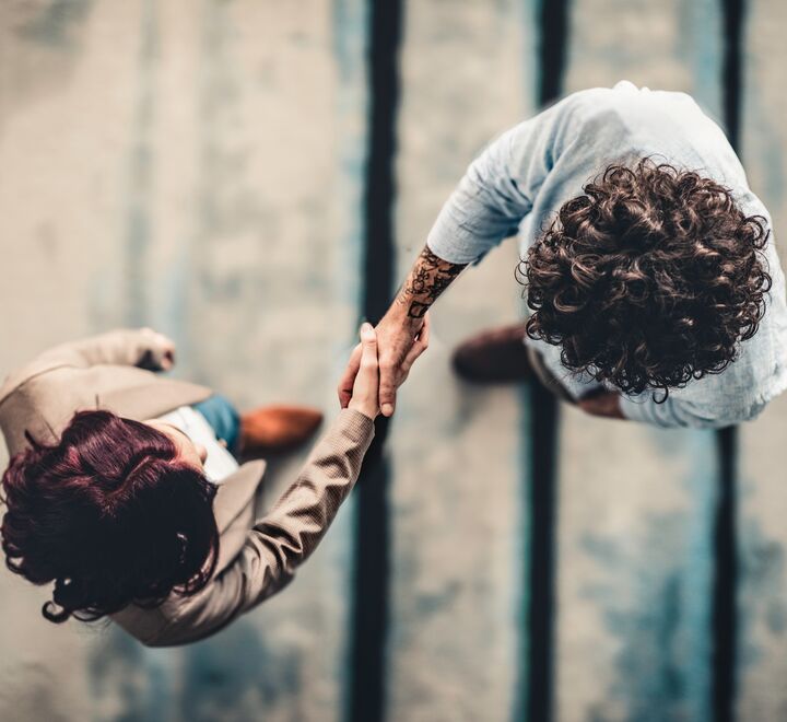 Two people shaking hands