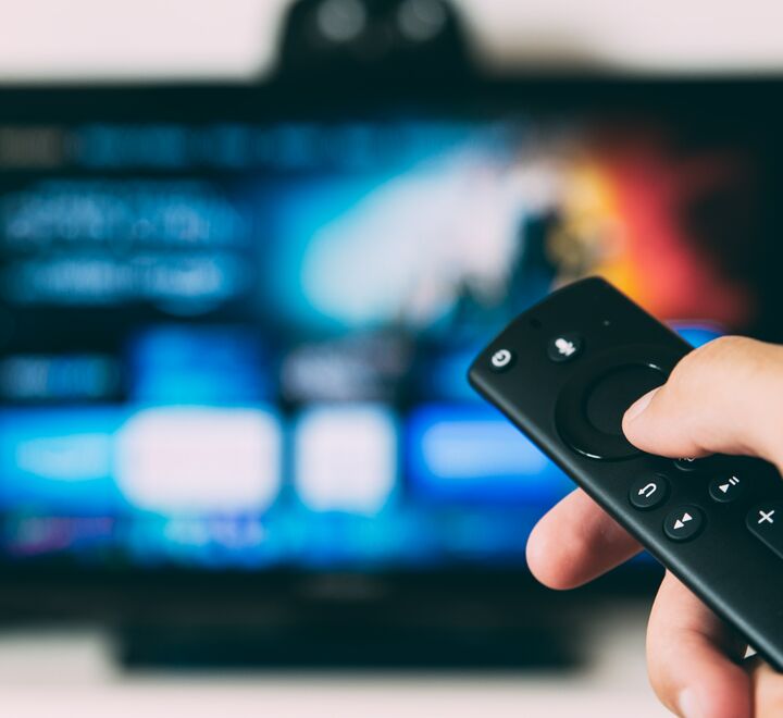 TV Remote pointing at TV