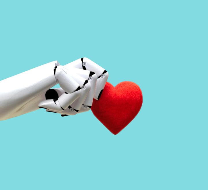 Robot-arm holder i et hjerte