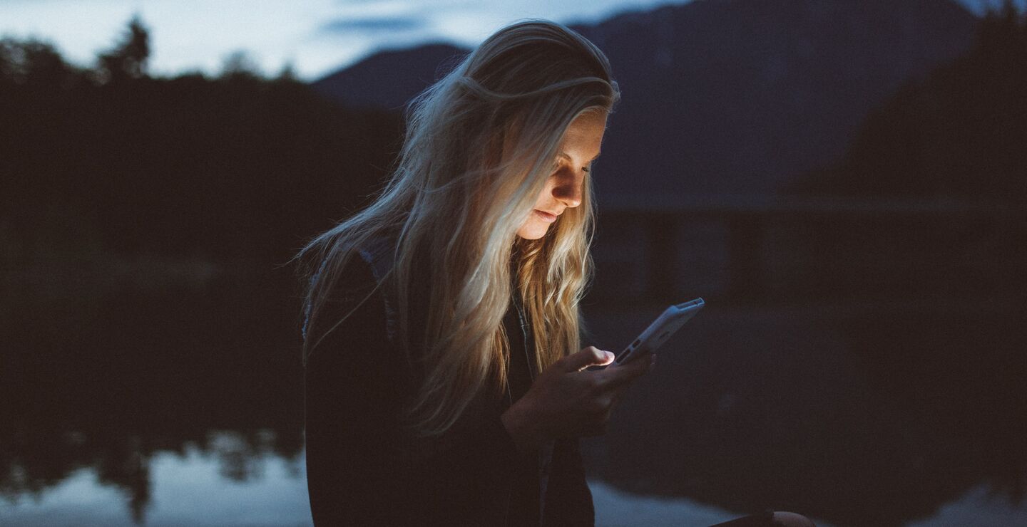 Koen Pauwels has researched apps (woman on phone pictured), to discover what makes customers buy products. Picture: Becca Tapert (unsplash)