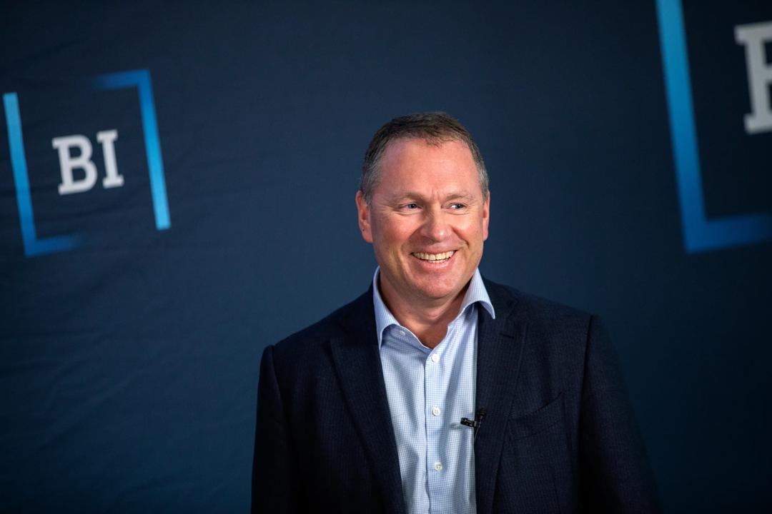 Nicolai Tangen in front of BI logo