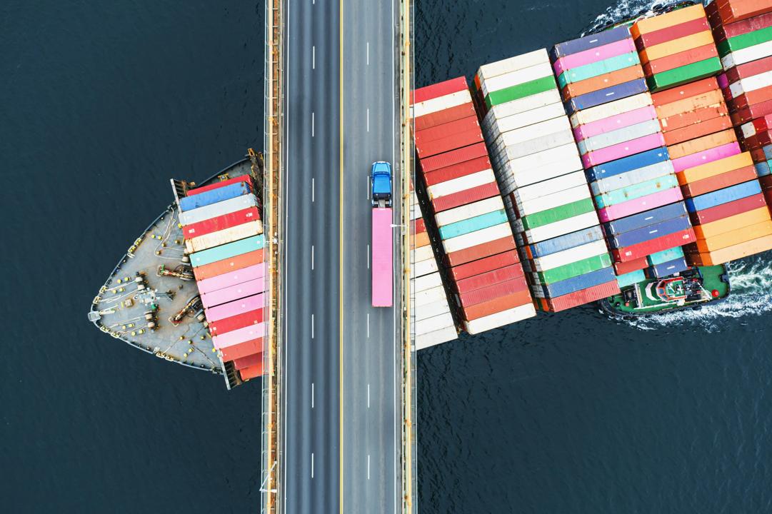 Supply chain truck and a shipping boat