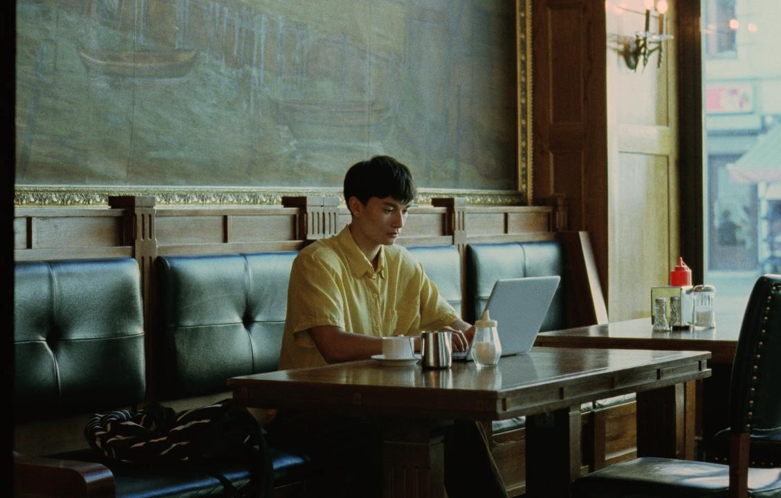 Student with laptop computer
