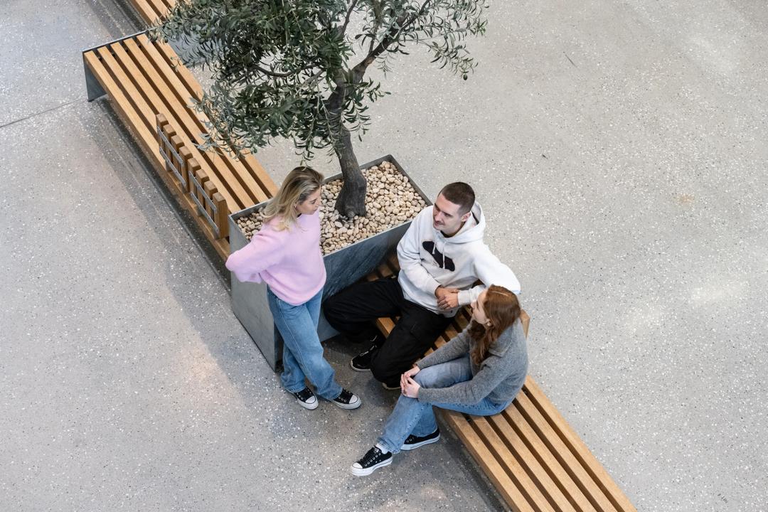 Three students talking at campus Bergen