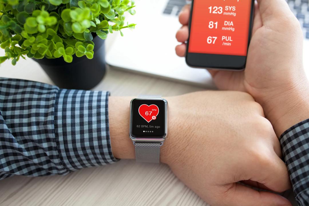 Introducing wearable devices can potentially be a game changer in creating happy, healthy and engaged employees. (Photo: Prykodov)