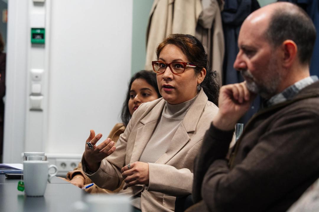 A woman from the audience speaking