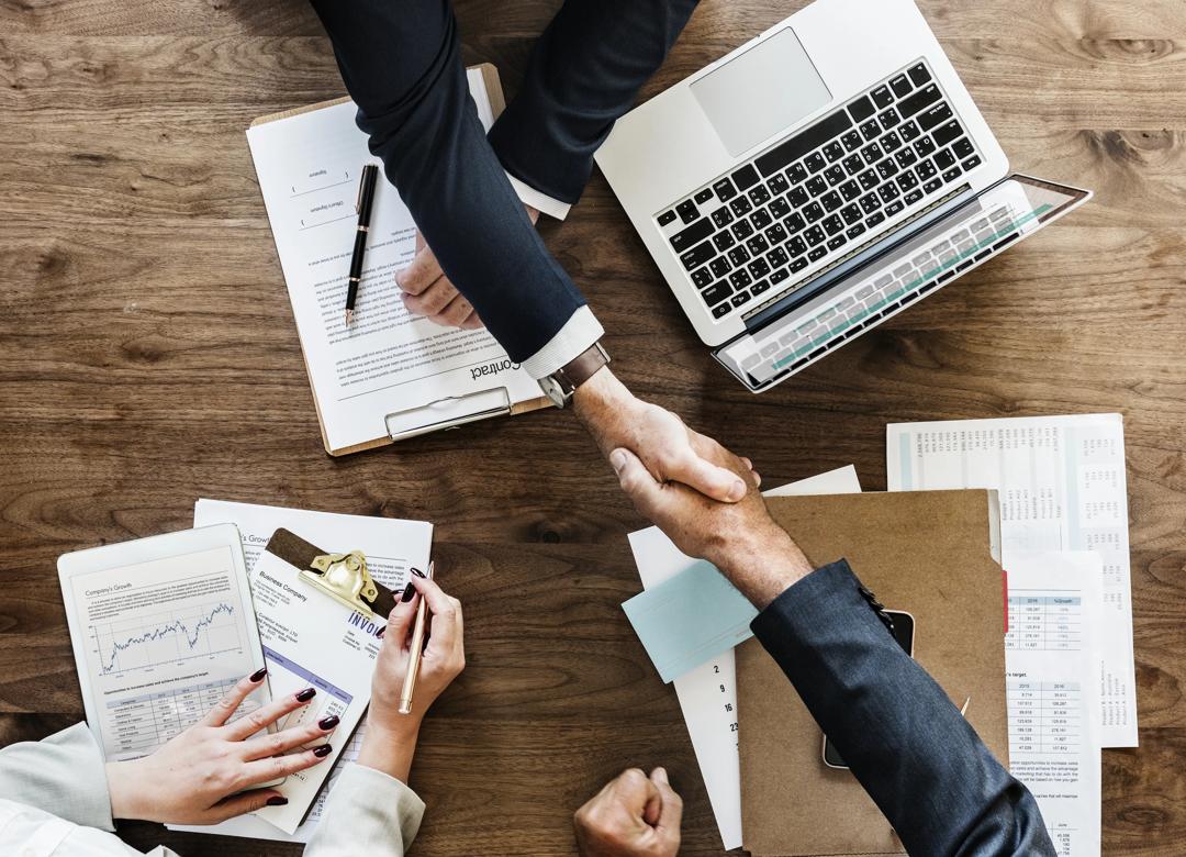 two people shaking hands