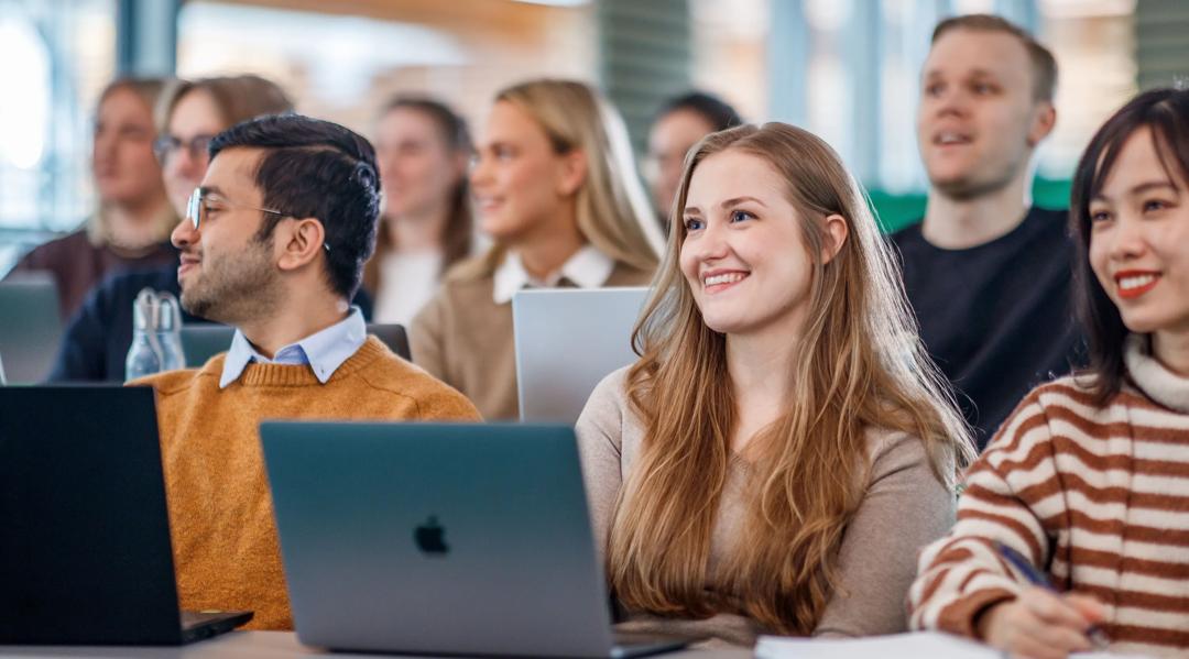 Student with a laptop computer