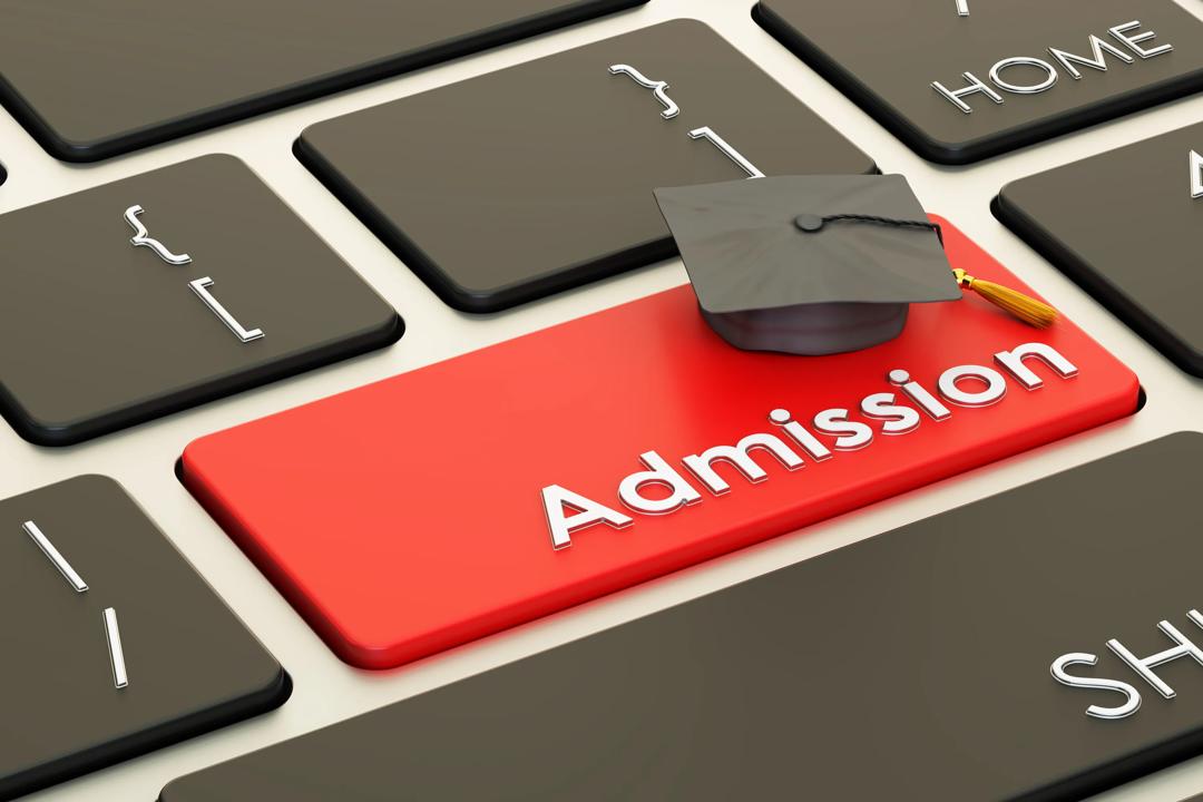 Admission concept on keyboard button