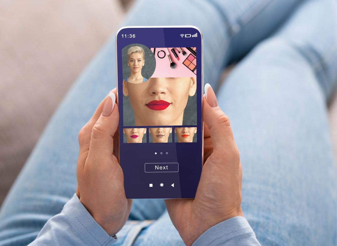 Woman trying different lipsticks with an app