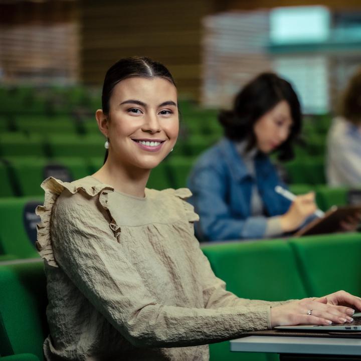 People smiling and writing
