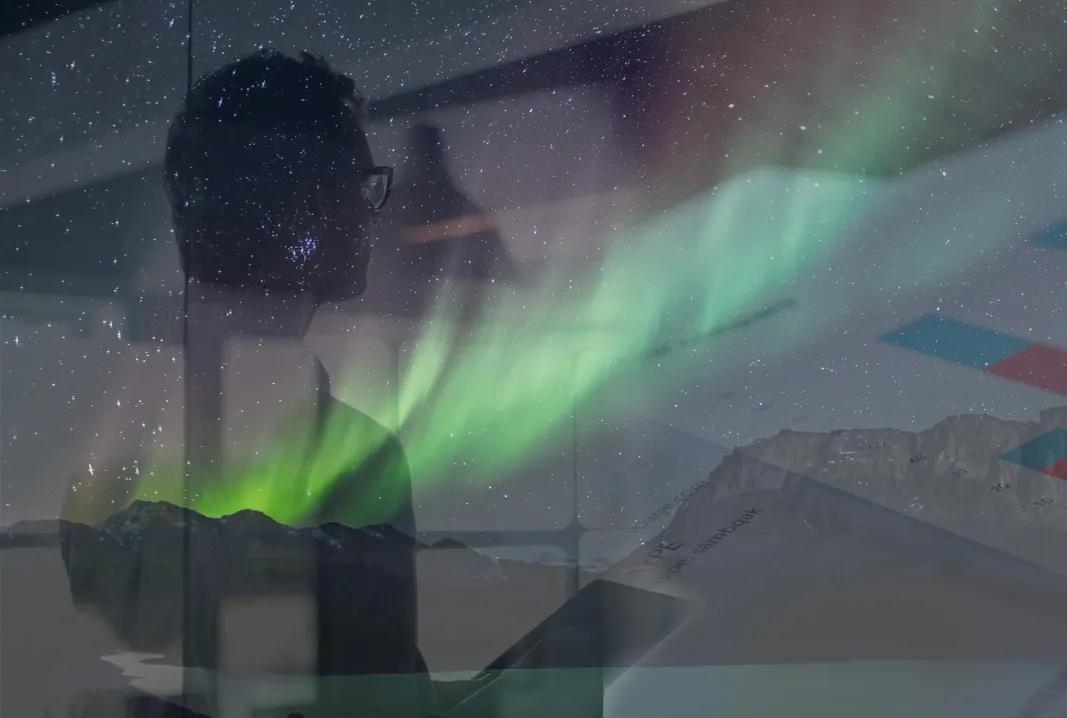 Northern lights, a man and a graph