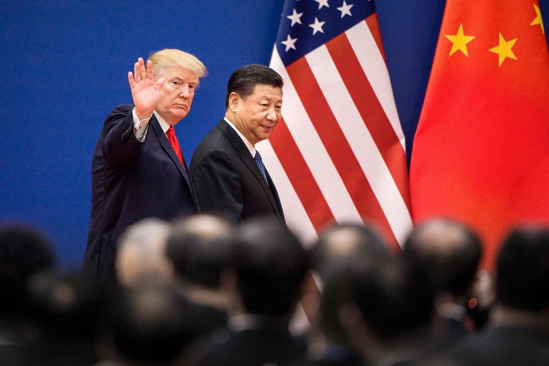 Handelskrigen mellom USA og Kina tilspisser seg. Kan sende konjunkturen ned og skape nye geopolitiske konflikter, skriver Knut Anton Mork. Bildet viser Donald Trump og Kinas president Xi Jinping. Foto: Nicolas Asfouri, Scanpix