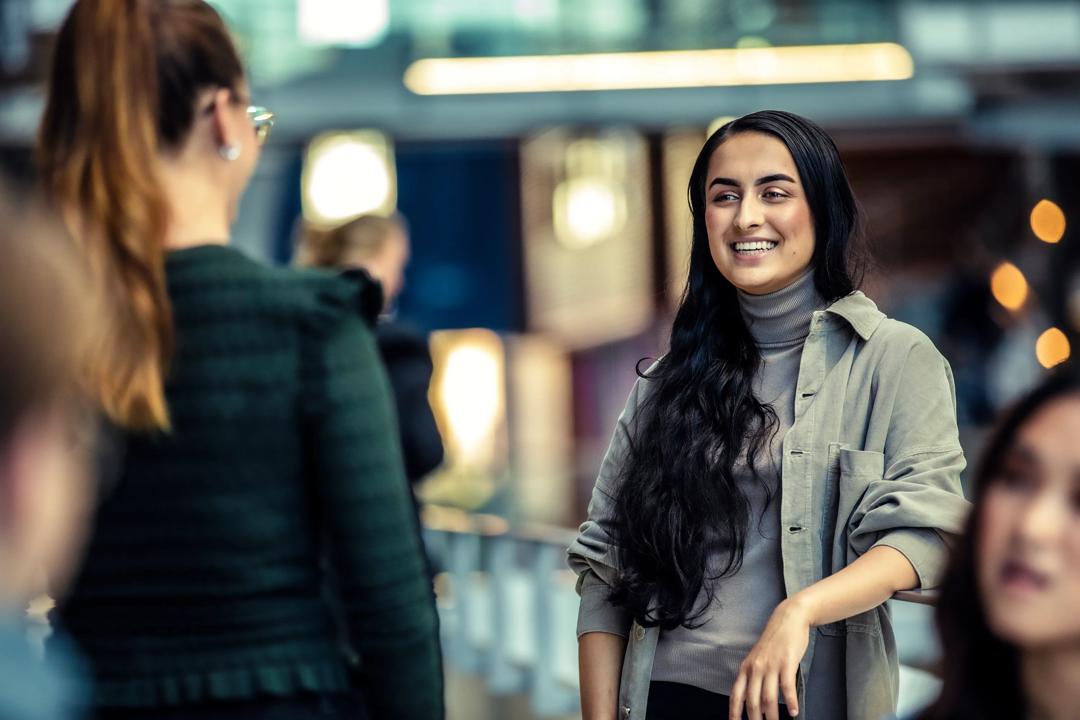Two students having a conversation