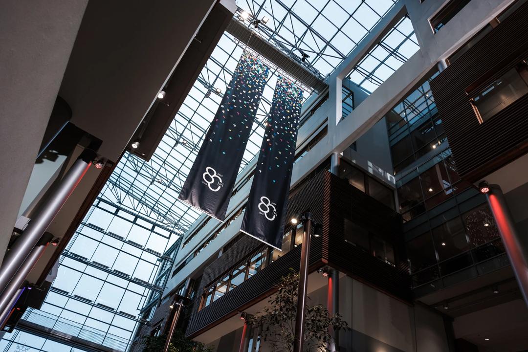 Banners of BI 80 years logo
