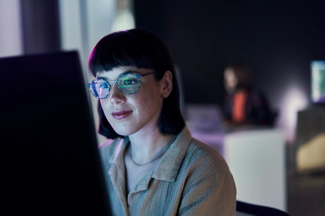 Woman looking at a screen
