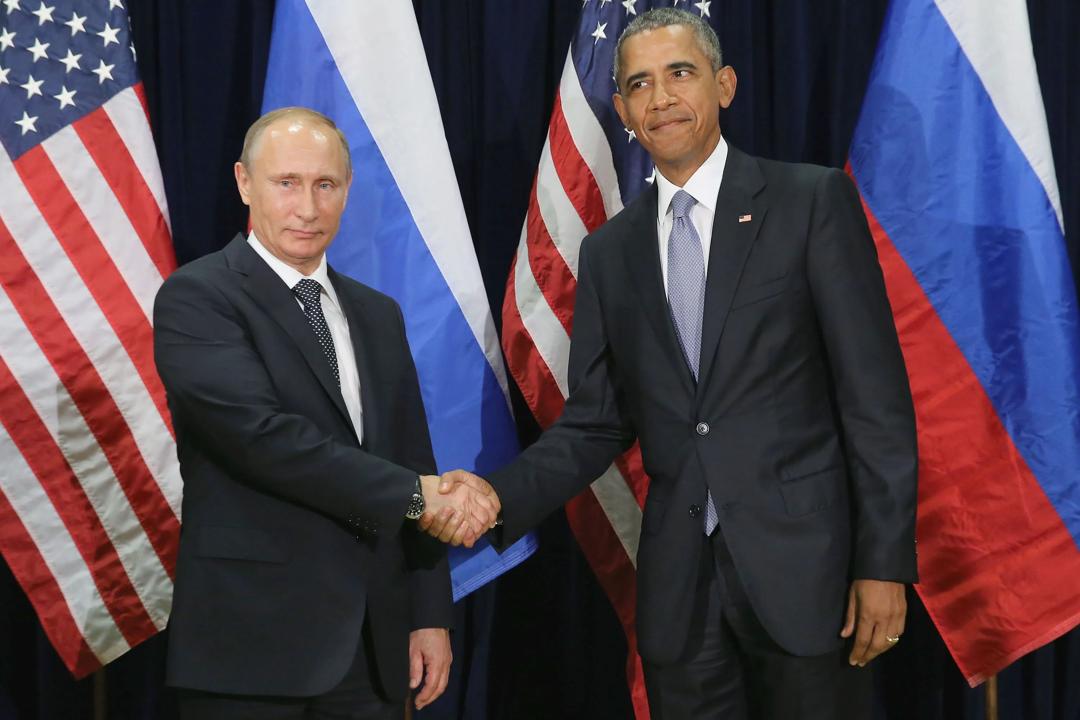 Russian President Valdimir Putin (L) and U.S. President Barack Obama shake hands before the start of a bilateral meeting at the United Nations headquarters September 28, 2015 in New York City.
